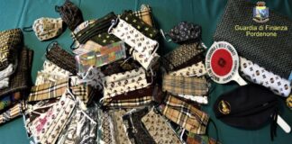 La Guardia di Finanza sequestra mascherine con griffes contraffatte e denuncia tre persone Le mascherine sequestrate